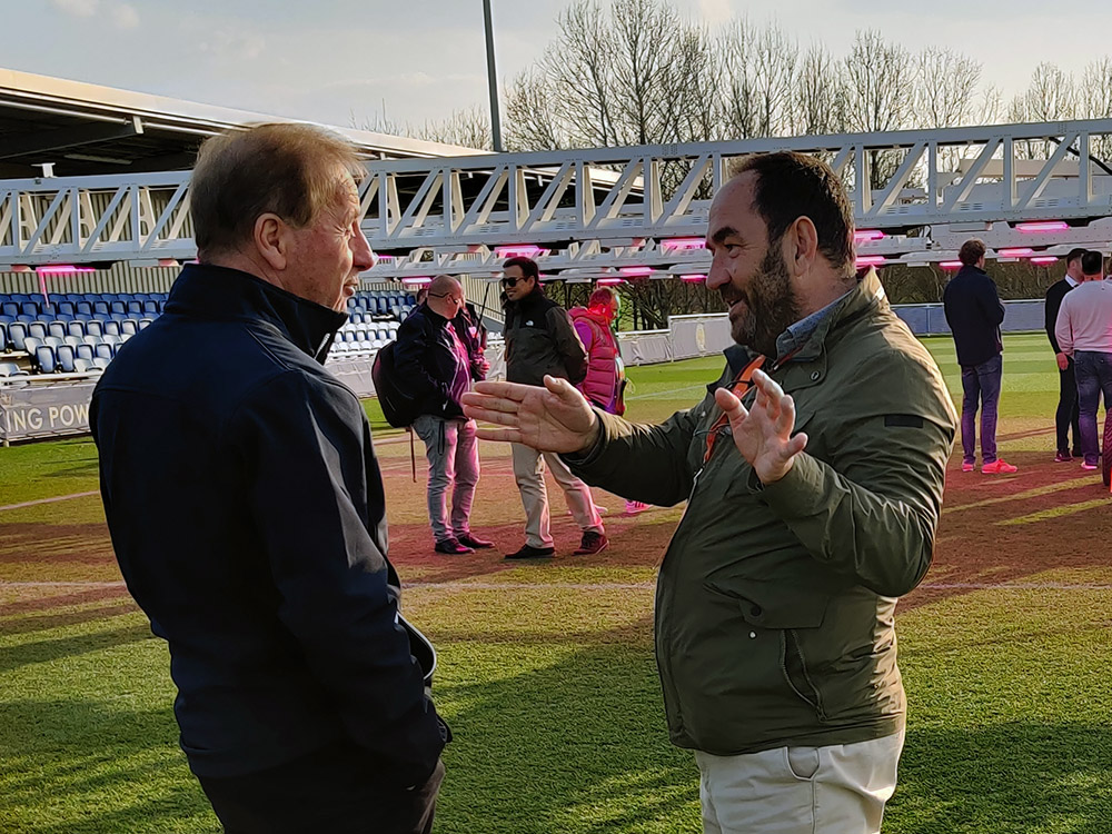SGL founder Nico van Vuuren and FC Barcelona Head Groundsman Octavi Creus talking on the pitch