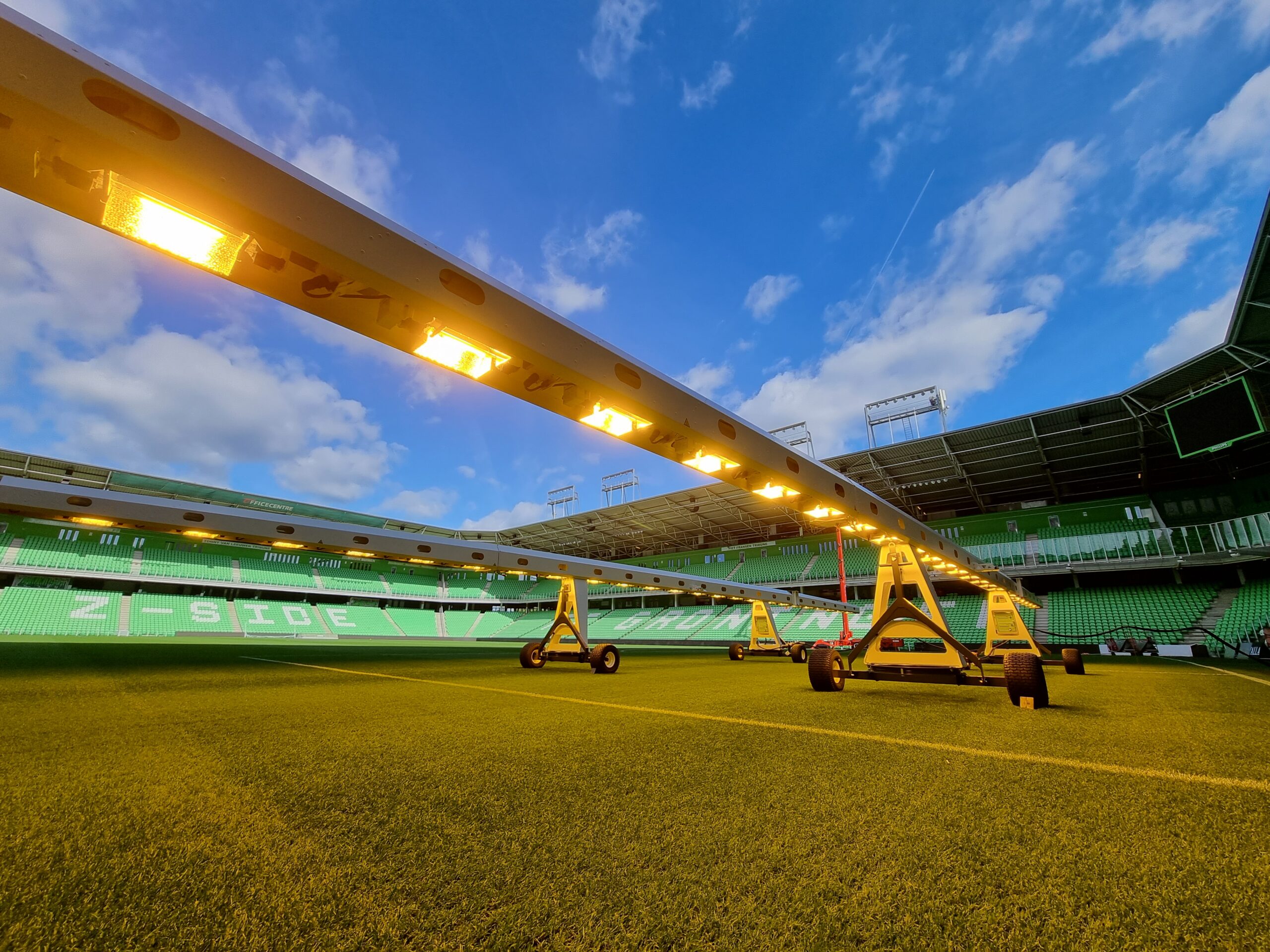 A close up of the SGL LU120 HPS grass grow lighting unit out on the stadium pitch of FC Groningen.