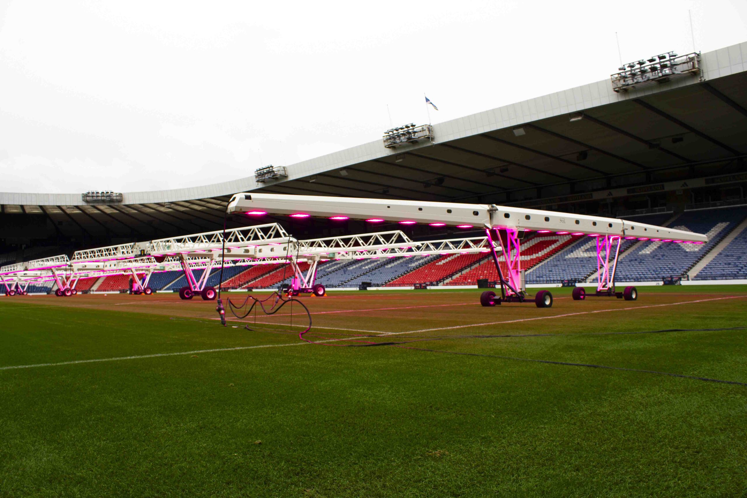 The SGL LED120 grow light on the pitch of Hampden Park, in the background the SGL LED440 grow lighting systems.